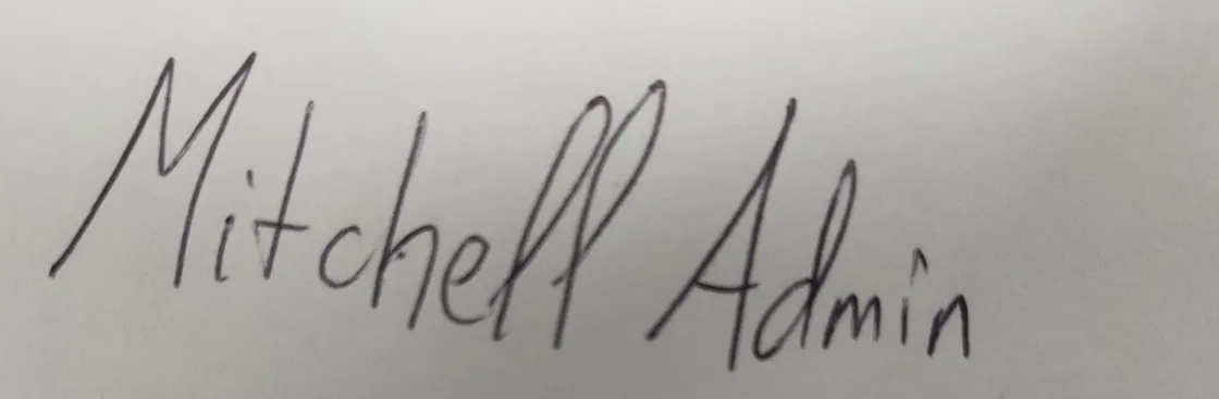 Fotografía de una firma realizada en papel a nombre de Mitchell Admin